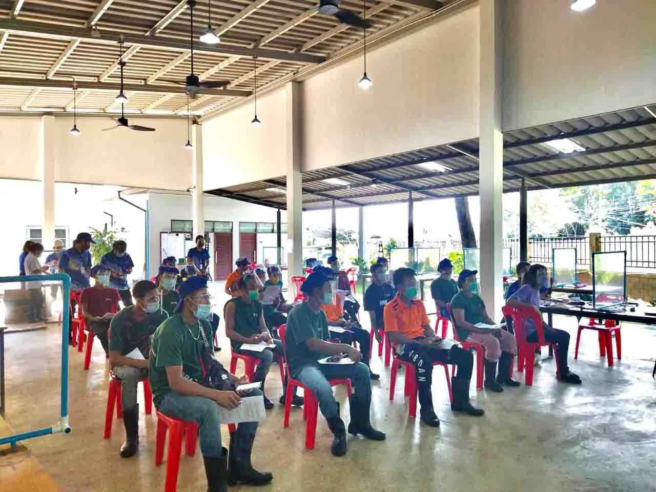 Tat Win workers at a worker-rights training session