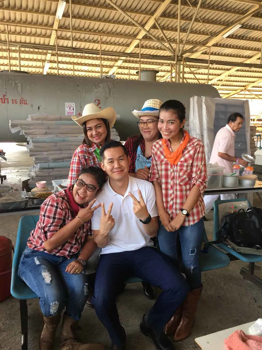 Tat Win management and staff at a team gathering