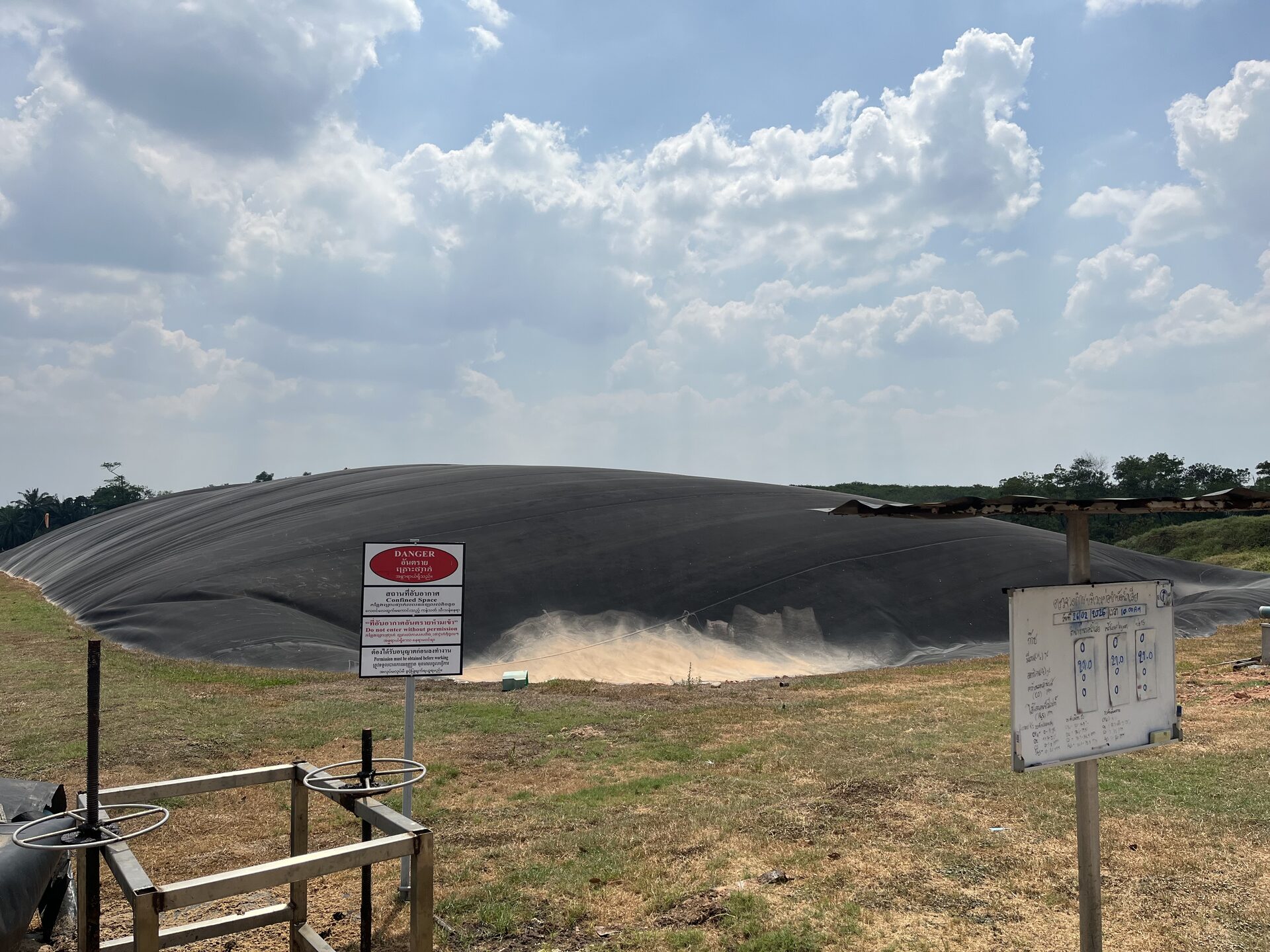 Covered biogas lagoon capturing methane from latex wastewater