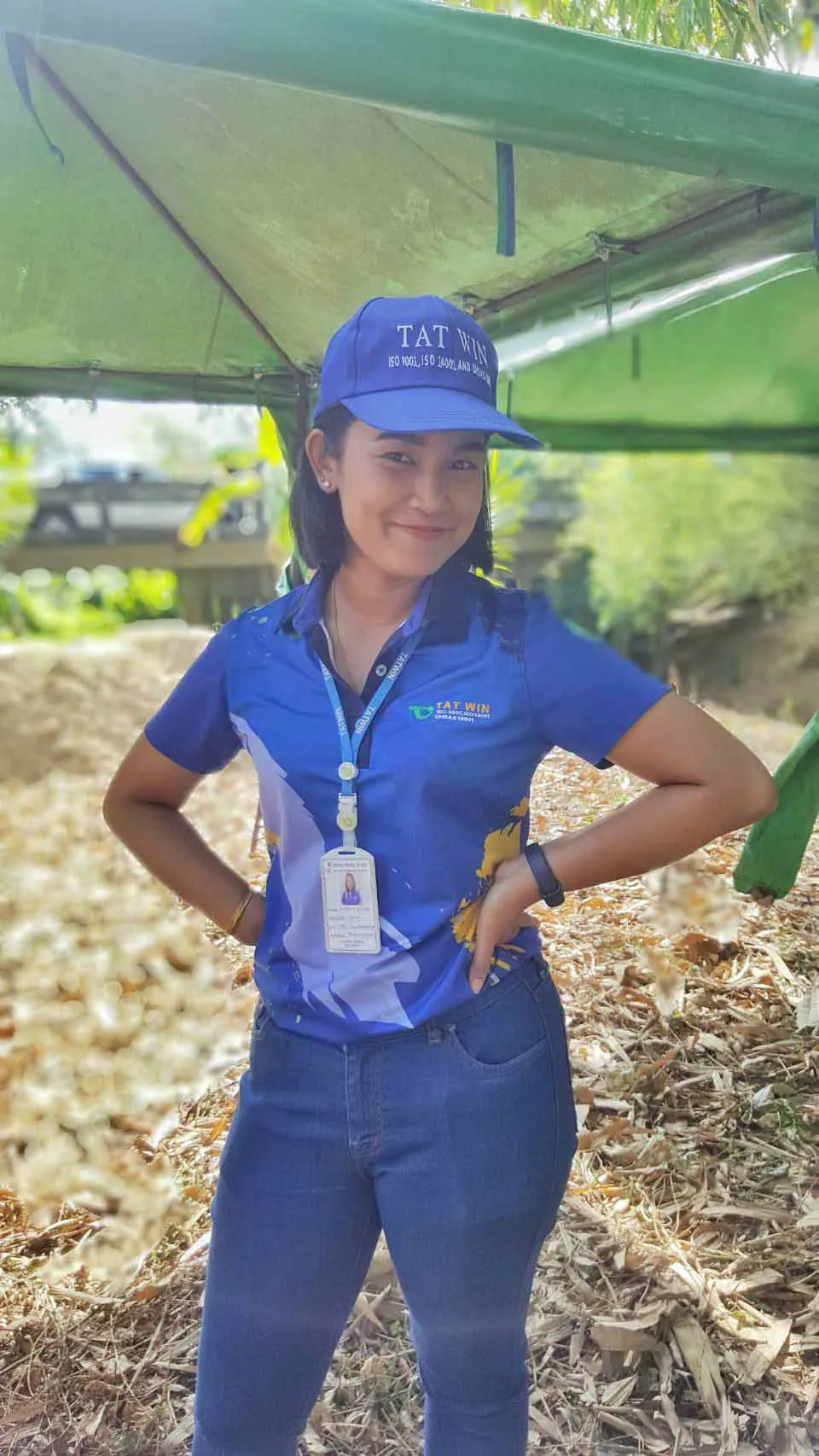 A Tat Win staff member in uniform